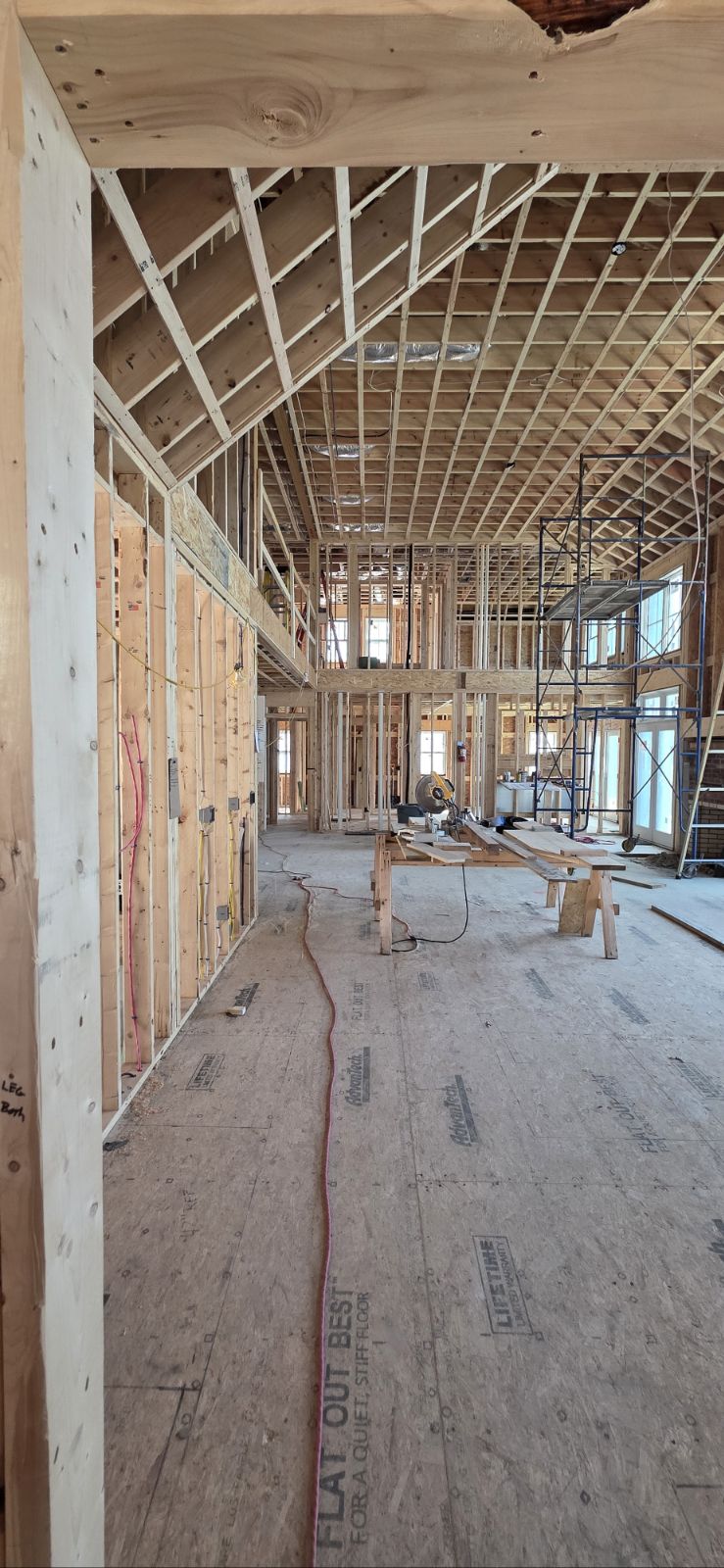 Cathedral-ceiling framing inside a custom home under construction in Southeastern Massachusetts